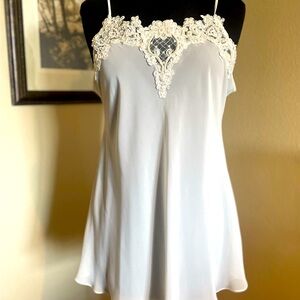 Satiny chemise with beautiful lace and beading. Cream, size medium. Never worn.